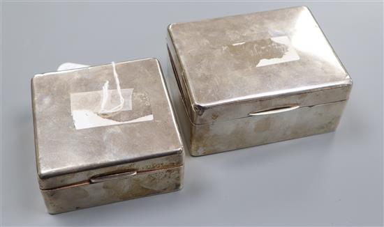 Two silver cigarette boxes, largest 11.2cm.